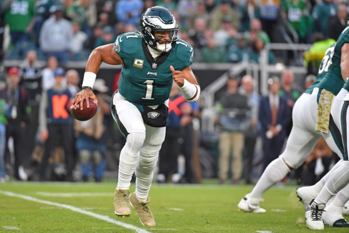 Philadelphia Eagles quarterback Jalen Hurts runs with the ball against the Dallas Cowboys.